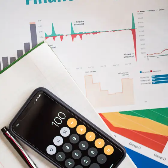 Printed financial reports and a calculator