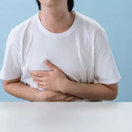A man holding his stomach