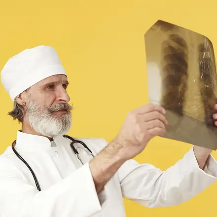 A doctor reading a chest X-ray