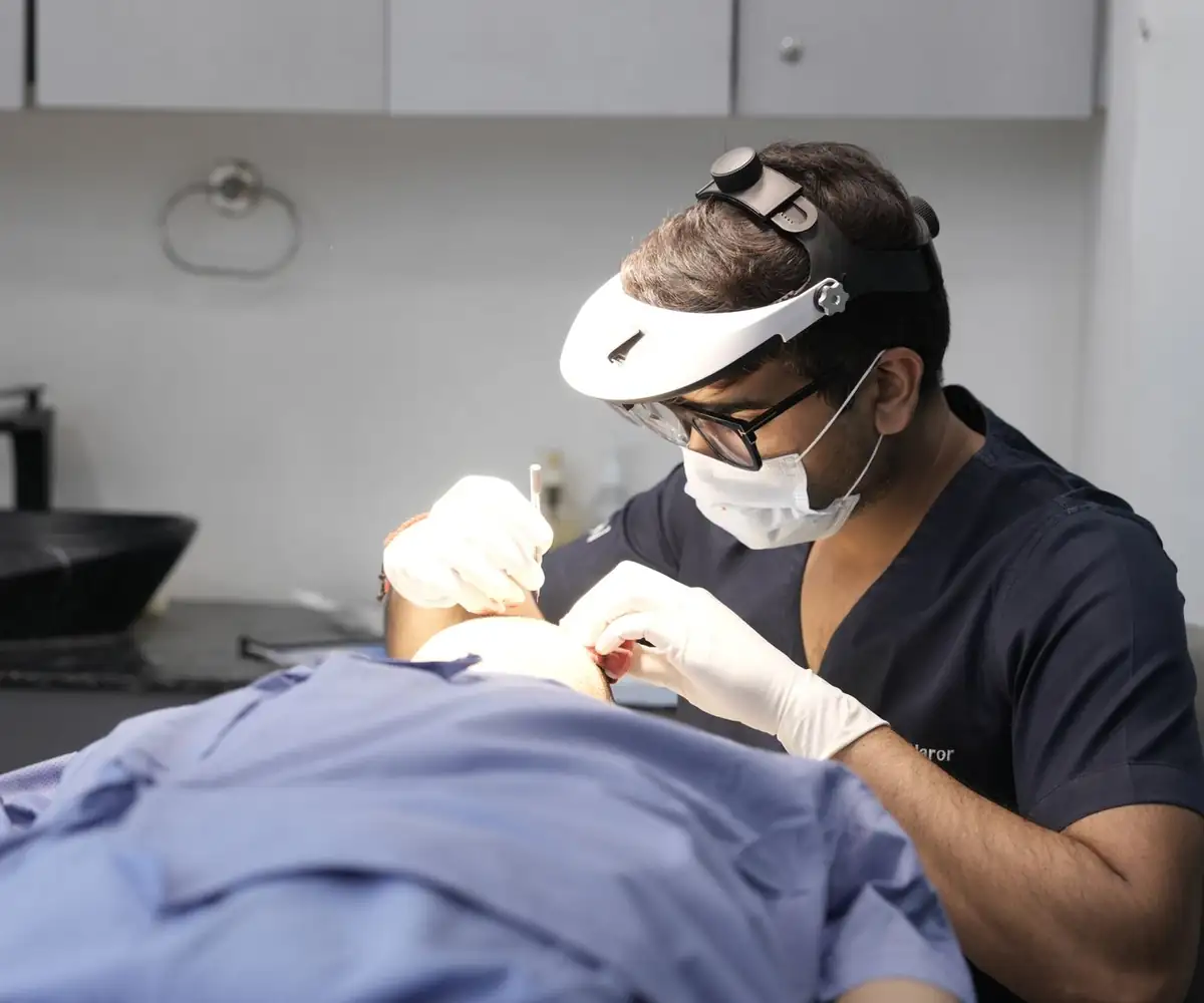 A dermatologist performing a skin procedure