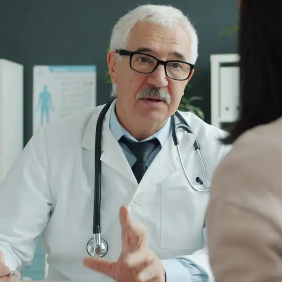 A family doctor explaining a treatment plan