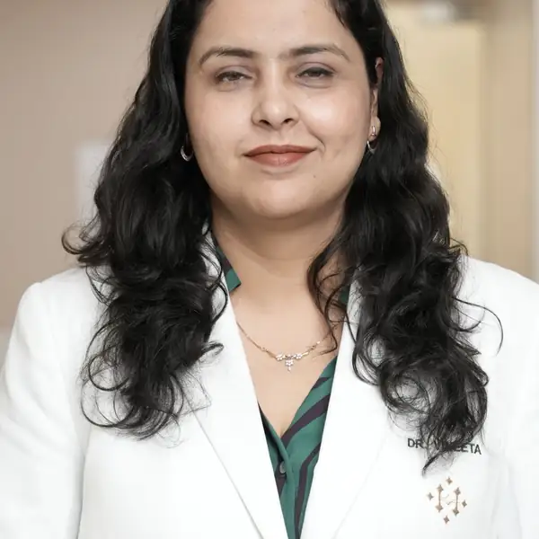 A physician in a clinic corridor