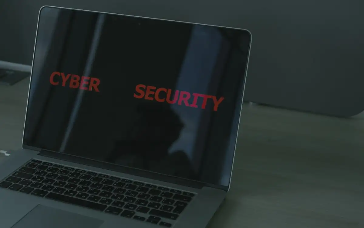 A laptop screen reading cyber security