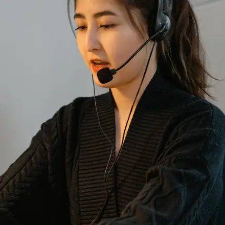 A support specialist wearing a headset